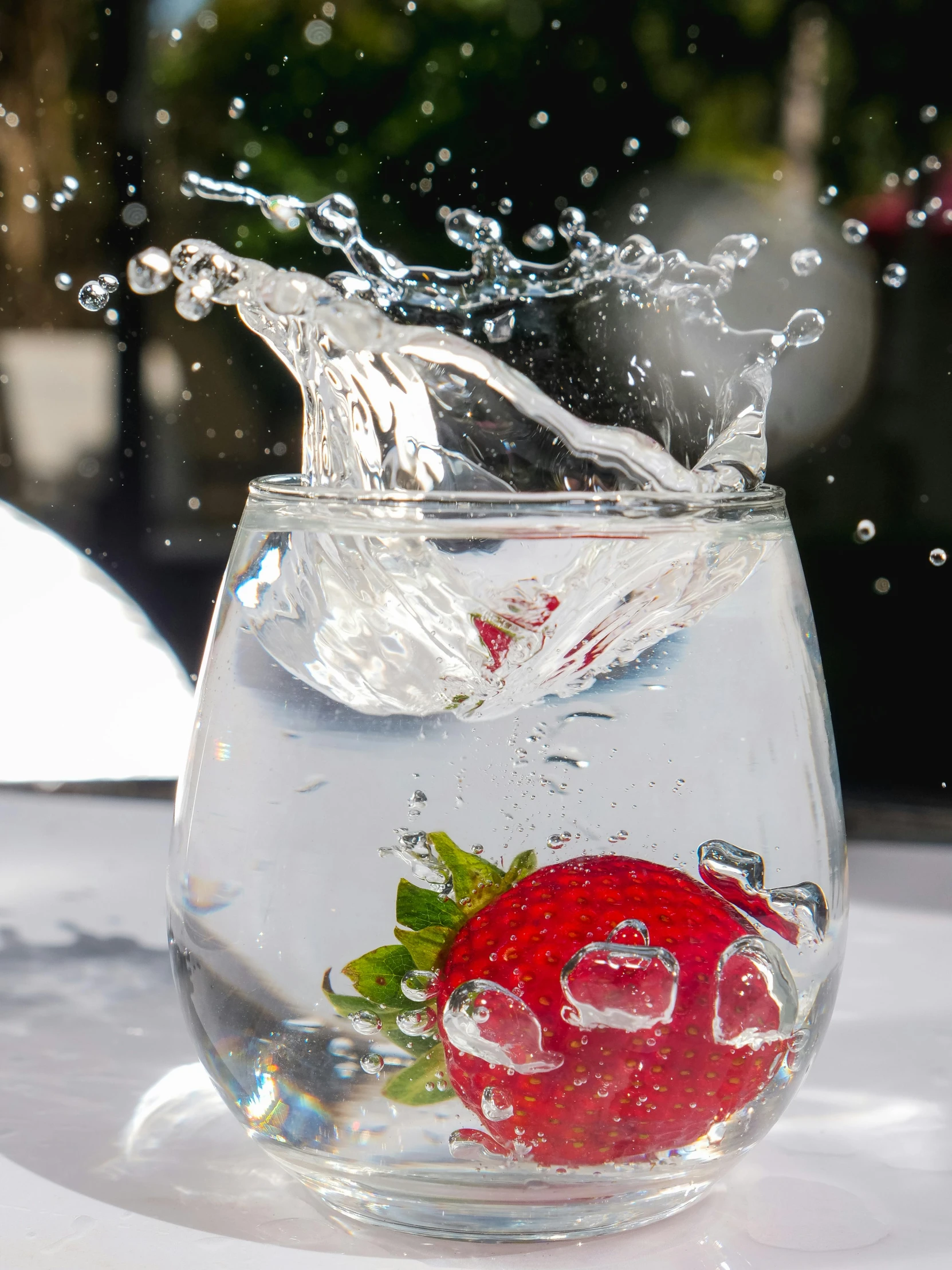 a glass of water with a strawberry in it, by Ryan Pancoast, shutterstock contest winner, bubbles in the air, sparkling water, promo image, infused