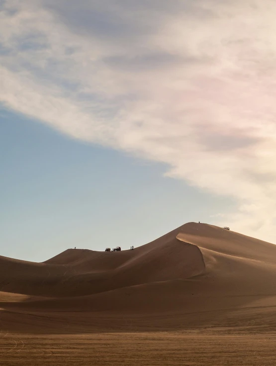 a group of people riding horses across a desert, inspired by Frederick Goodall, unsplash contest winner, on dune, late summer evening, 4k”, hillside desert pavilion