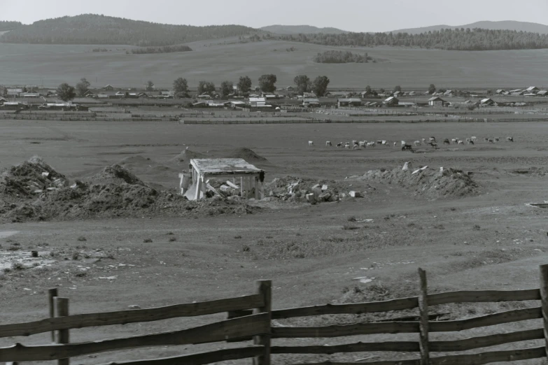 an old black and white photo of a farm, unsplash, land art, shanty town, crewdson, panoramic, 1980s photo