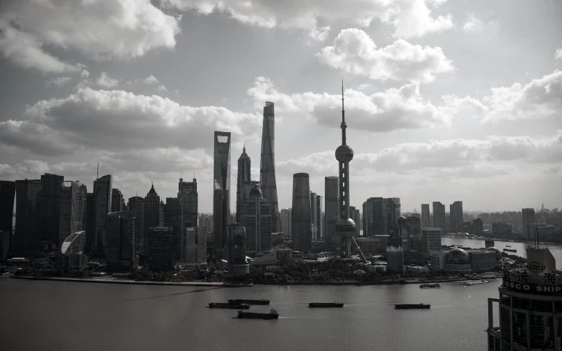 a black and white photo of a city skyline, inspired by Cheng Jiasui, pexels contest winner, oriental, slight overcast, album cover, high - resolution