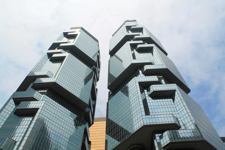 a couple of tall buildings next to each other, inspired by Cheng Jiasui, unsplash, hypermodernism, morphosis, exterior view, y2k”, uhq