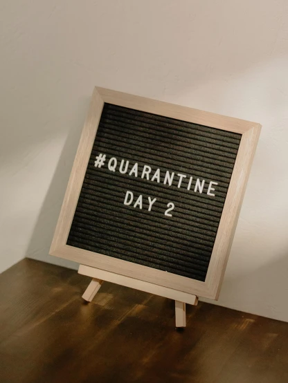 a sign that says quarantine day 2 on it, unsplash contest winner, square, '0 0 s nostalgia, :6, alternate angle