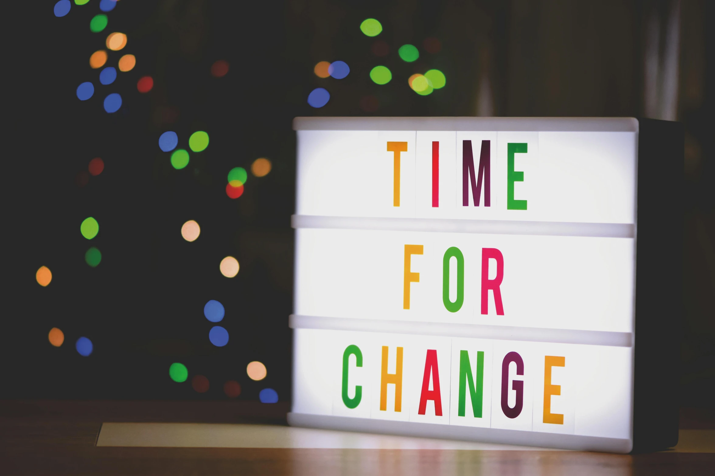 a light box with the words time for change on it, by Julia Pishtar, multi colour, mood light, adult, multi-part