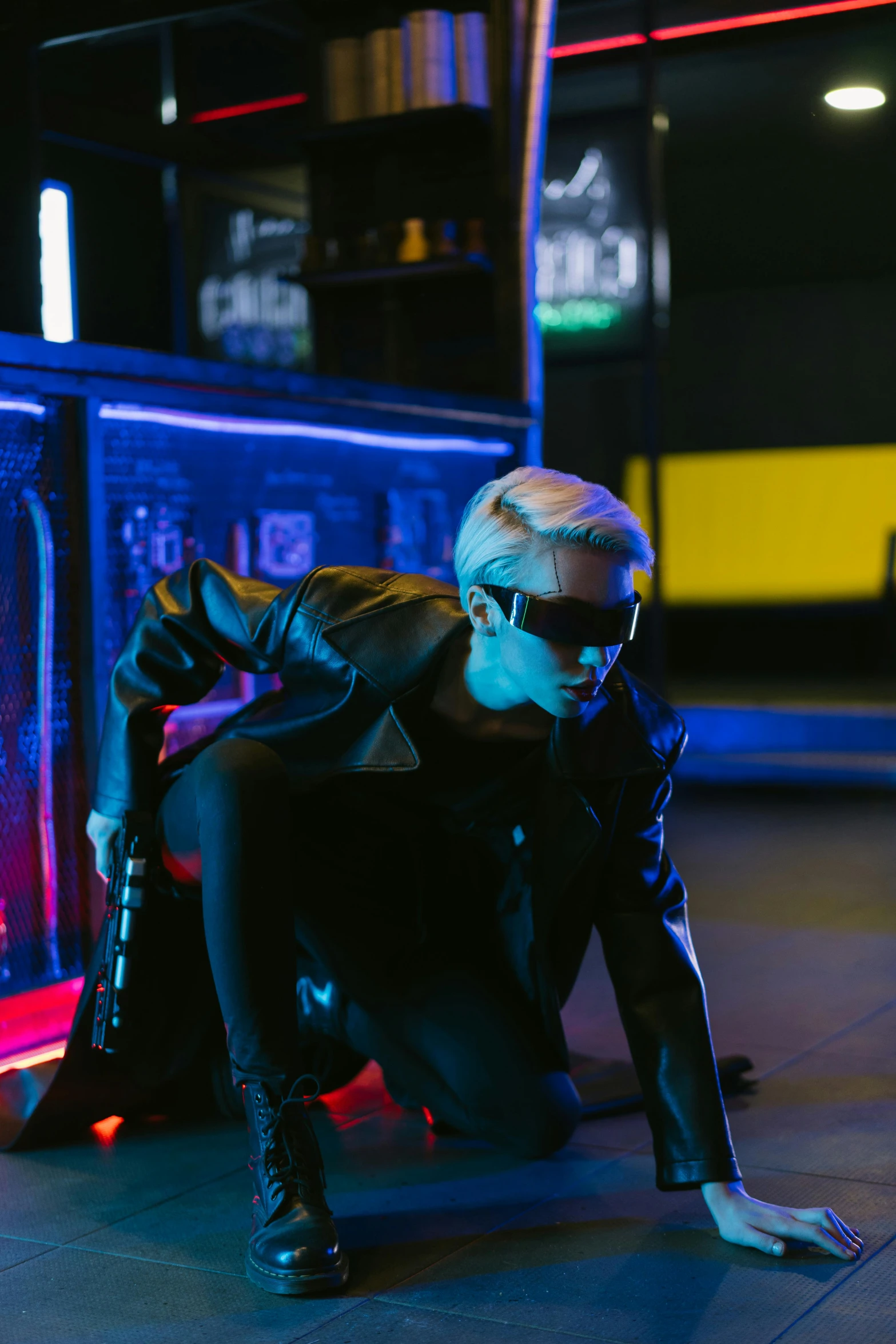 a man sitting on the ground in front of a bus, cyberpunk art, trending on pexels, iu lee ji-eun as a super villain, cyberpunk nightclub, vergil, as action figures