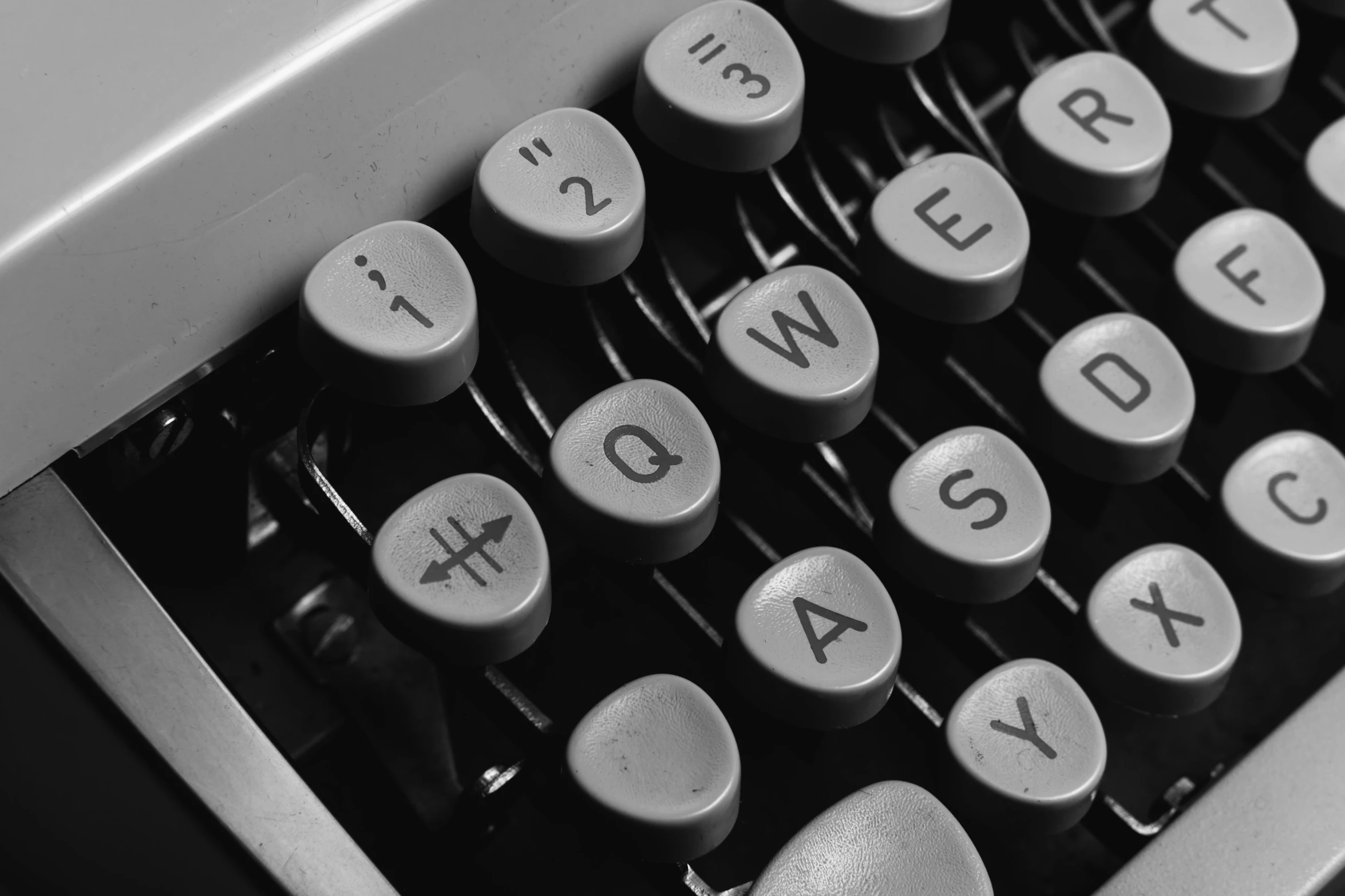 a black and white photo of an old typewriter, by Carey Morris, letterism, 1970s photo, keys, vintage - w 1 0 2 4, detail