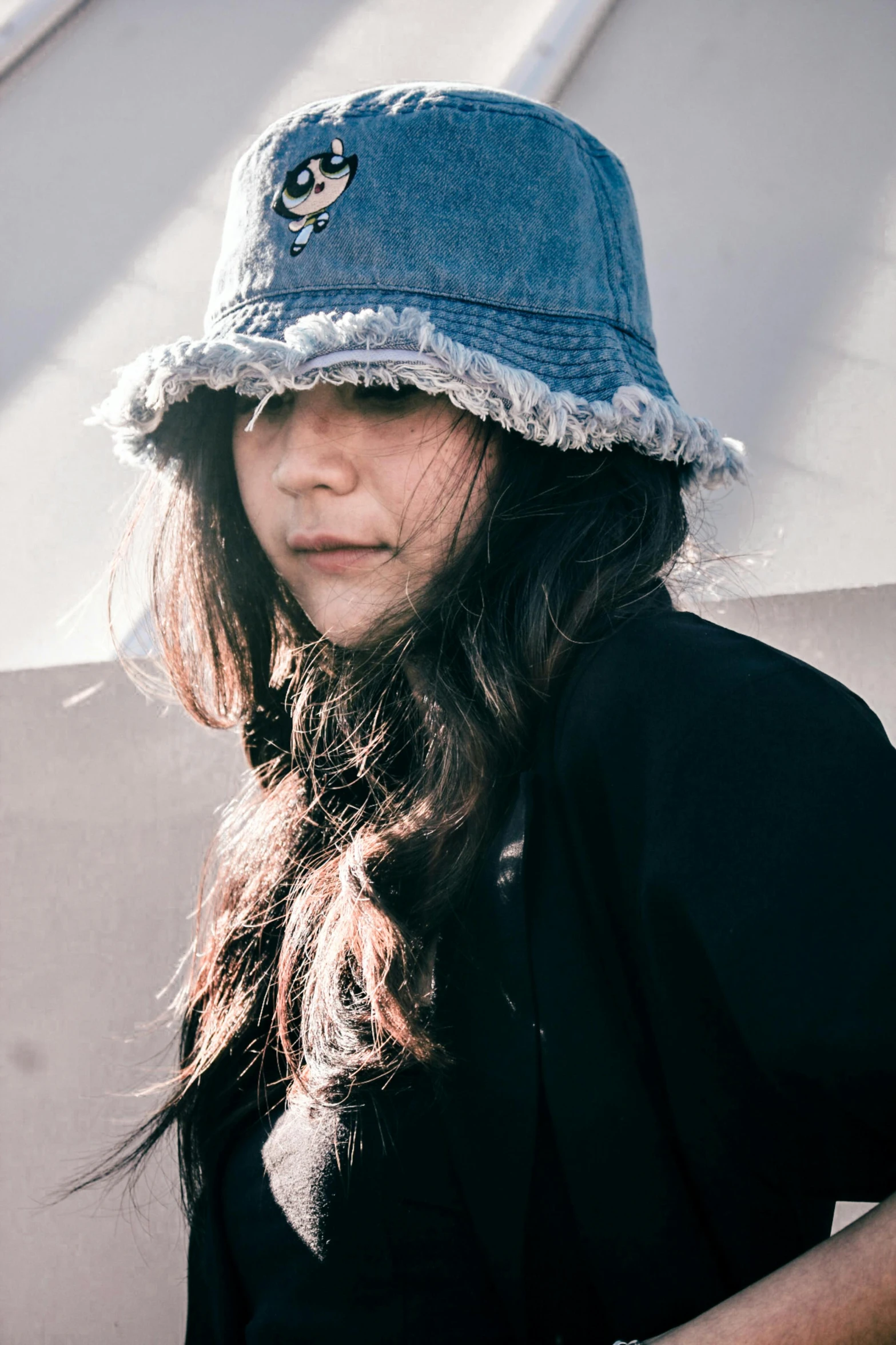 a close up of a person wearing a hat, she is wearing streetwear, wearing ragged clothing, kids, young with long hair