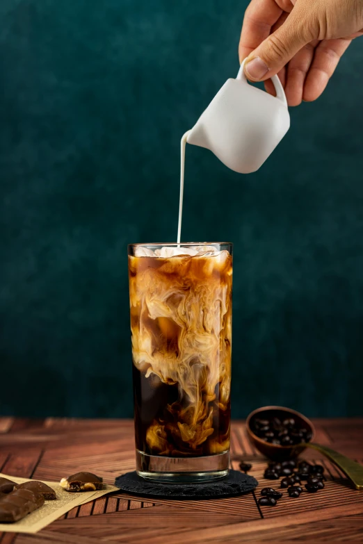 a person pouring coffee into a tall glass, by Julia Pishtar, process art, iced latte, 4k polymer clay food photography, square, 2995599206