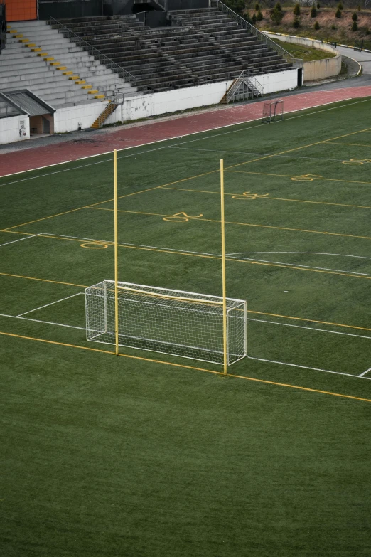 a soccer field with a goal in the middle of it, by Dan Scott, shutterstock, 15081959 21121991 01012000 4k, square, stanchions, high school