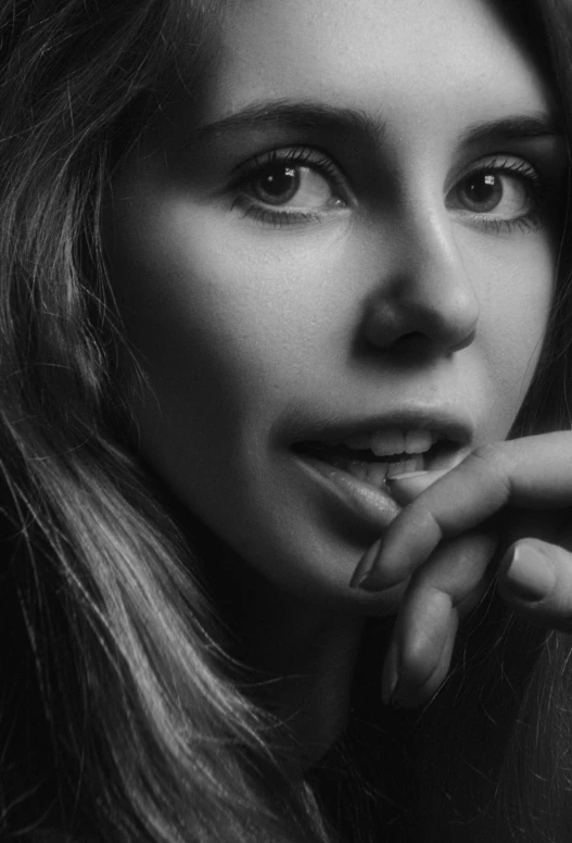 a black and white photo of a woman with long hair, inspired by Yousuf Karsh, hyperrealism, emma roberts, high angle closeup portrait, ansel ], monochrome 3 d model