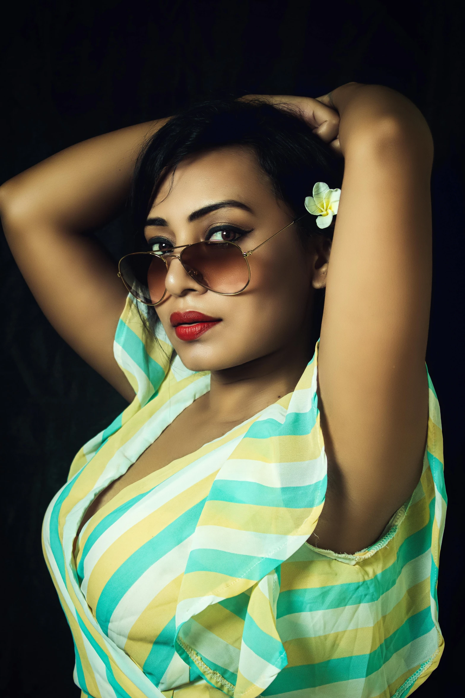 a woman with a flower in her hair, an album cover, by Ella Guru, instagram, tachisme, assamese, busty, with sunglass, 5 0 0 px models