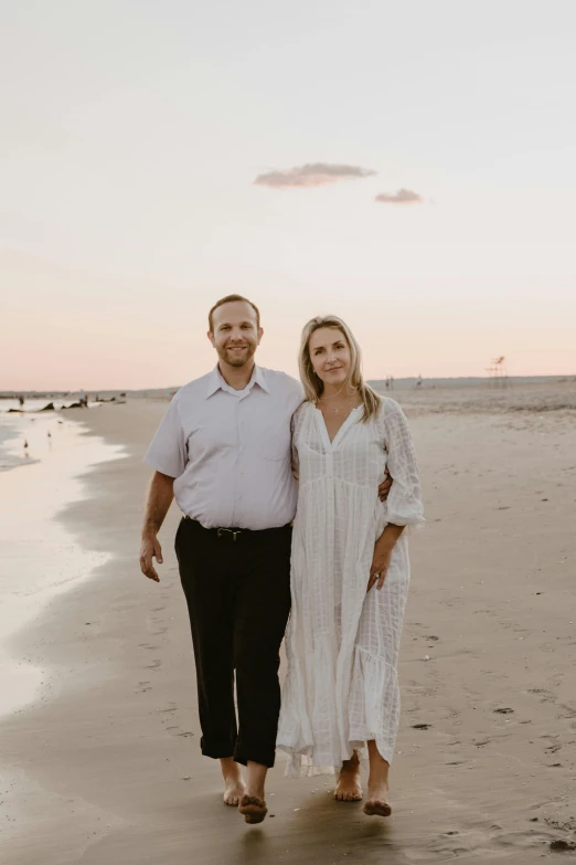 a man and woman standing next to each other on a beach, profile image, commercial photo, full body photo of steve, late evening