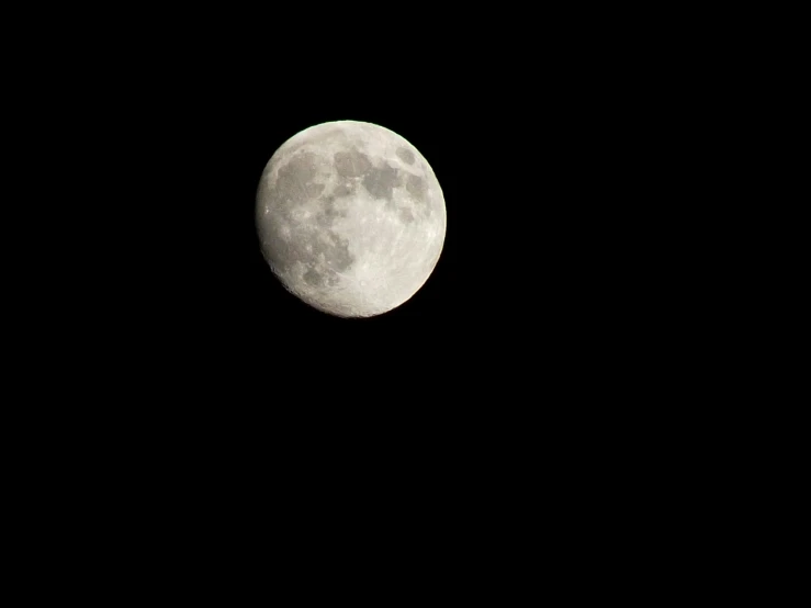 the moon is lit up in the dark sky, a photo, by Jan Rustem, minimalism, short telephoto, ☁🌪🌙👩🏾, fuji x 1 0 0 f, 1 2 0 mm macro