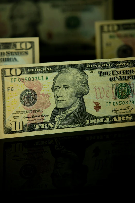 a bunch of money sitting on top of a table, slide show, usa-sep 20, alexander hamilton style, promo image