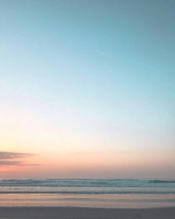 a man riding a surfboard on top of a sandy beach, pexels contest winner, minimalism, pastel sunset, bali, panorama view of the sky, pastel colours