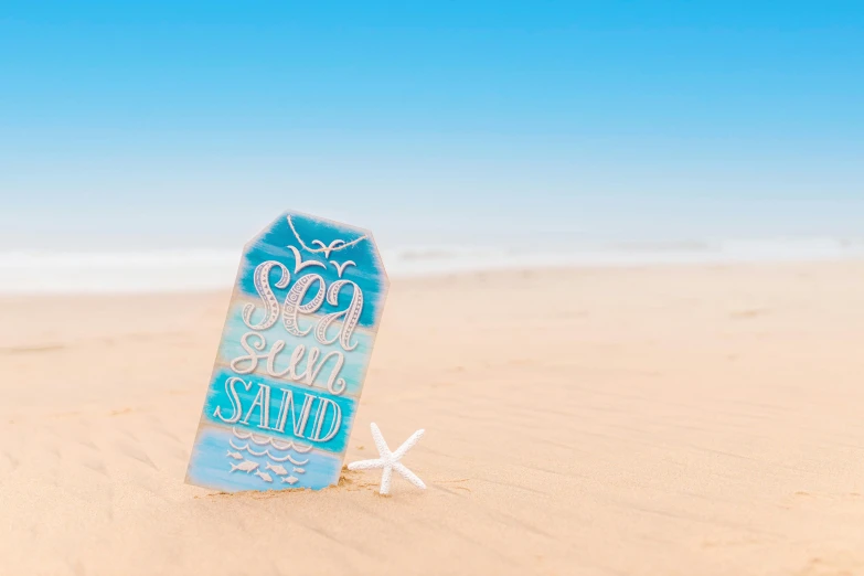 a surfboard sitting on top of a sandy beach, standing under the sea, pastel blue, sign, on the sand