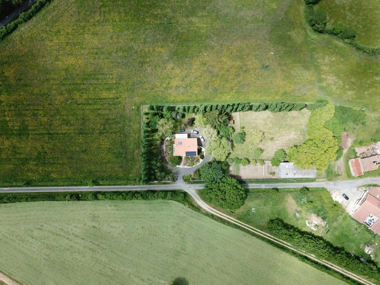 a bird's eye view of a rural area, inspired by Jan Rustem, pexels contest winner, next to a farm house and a barn, hedges, very high resolution images, viewed from the ground