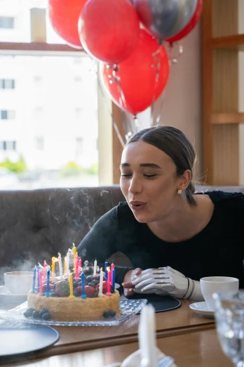 a woman blowing out candles on a birthday cake, a portrait, by Sven Erixson, trending on unsplash, happening, smoker, gal gadot china plate, multiple stories, cover story