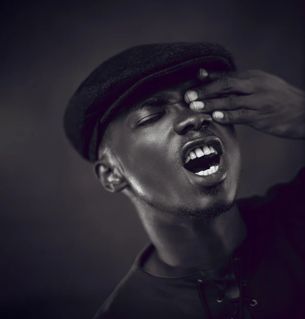 a black and white photo of a man with his mouth open, by Matija Jama, pexels contest winner, realism, handsome hip hop young black man, giga chad crying, mrbeast, squinting at high noon