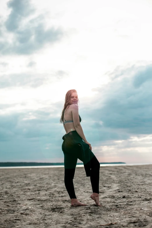 a woman standing on top of a sandy beach, profile image, sydney sweeney, large)}], leaked image