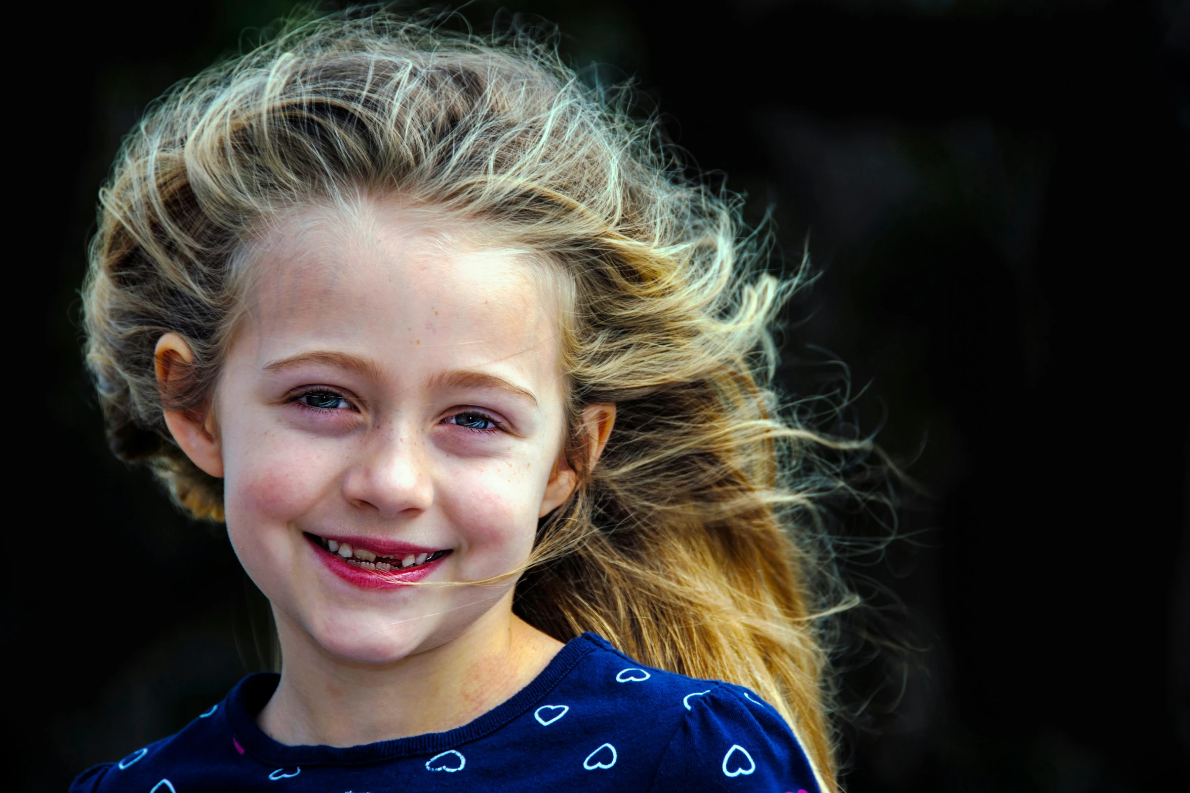 a little girl with a big smile on her face, a picture, by Sven Erixson, pexels contest winner, wind blown hair, mini model, portrait. 8 k high definition, taken in 2 0 2 0