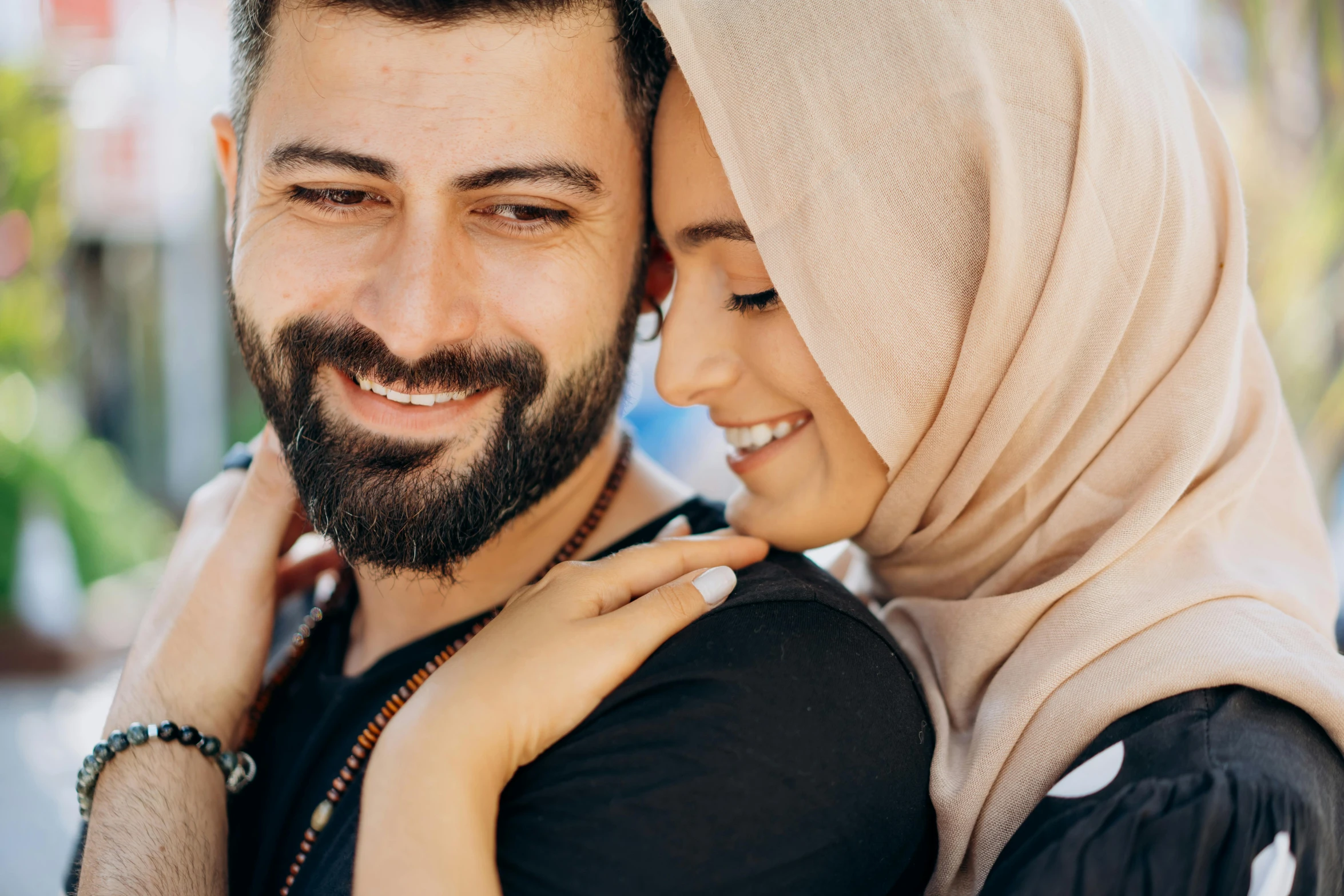 a close up of a person wearing a headscarf, trending on pexels, hurufiyya, smiling couple, caucasian, holding each other, orthodox