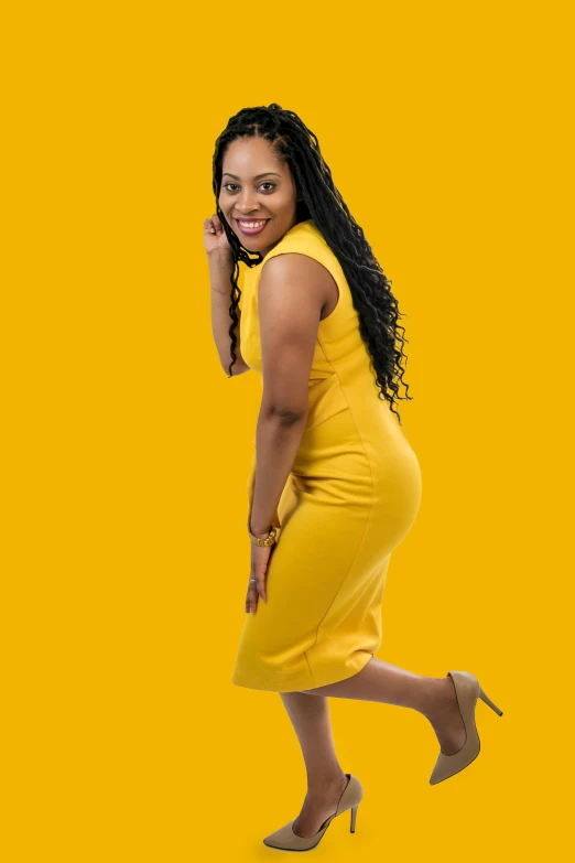 a woman in a yellow dress talking on a cell phone, an album cover, by Chinwe Chukwuogo-Roy, pexels, full entire body fun pose, battle action pose, ceo, bending down slightly