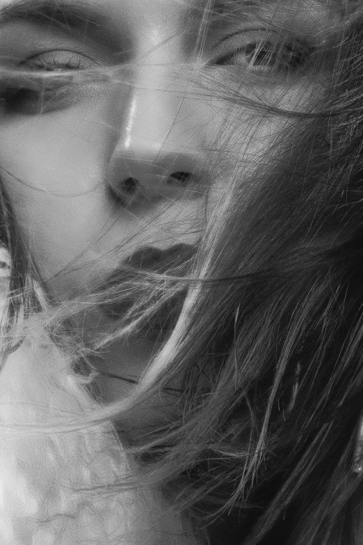 a black and white photo of a woman with long hair, tumblr, photorealism, neck zoomed in from lips down, ((messy)), hiding, 🌺 cgsociety