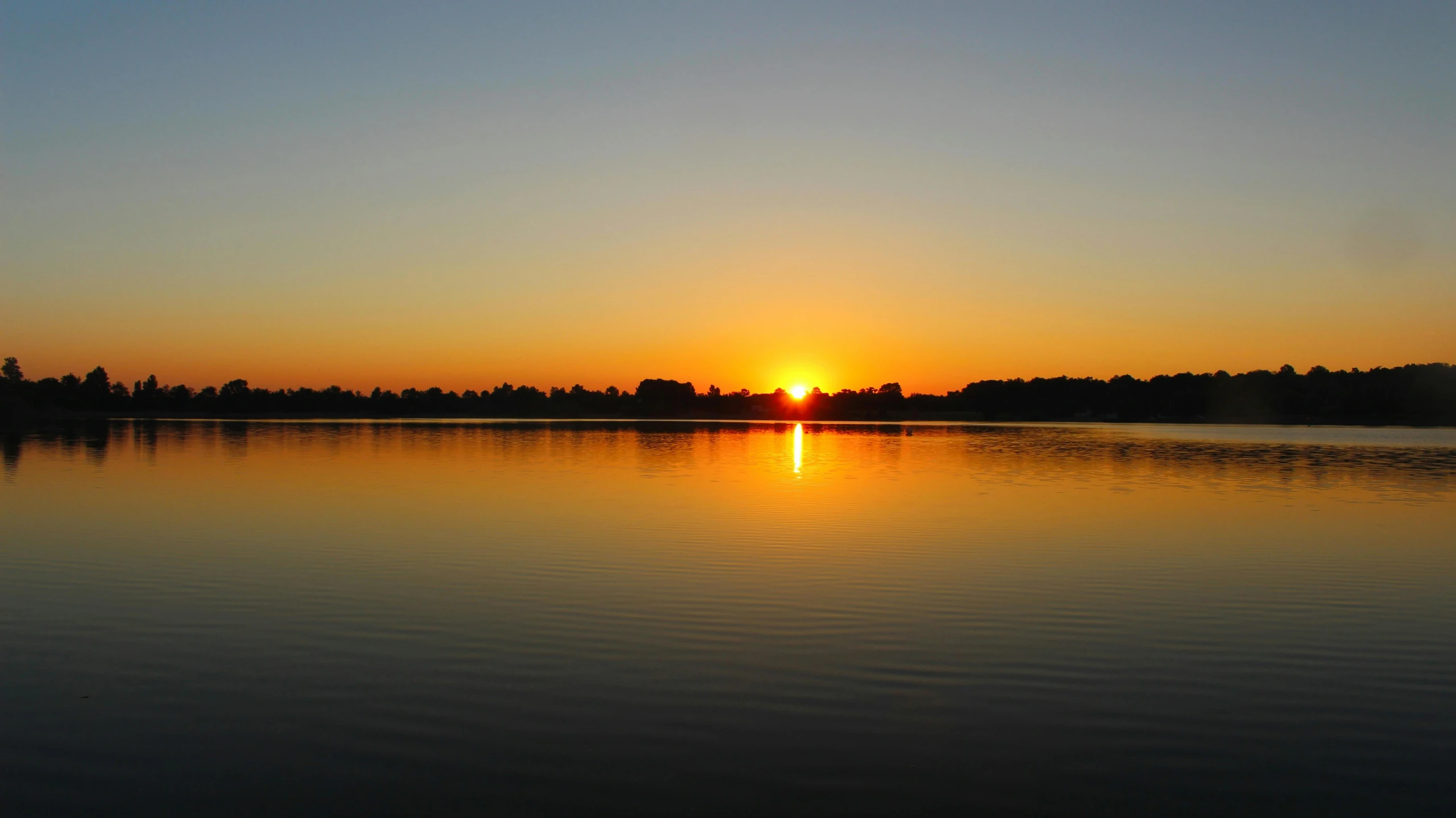 the sun is setting over a body of water, on a lake, no cropping, landscape photo, fan favorite