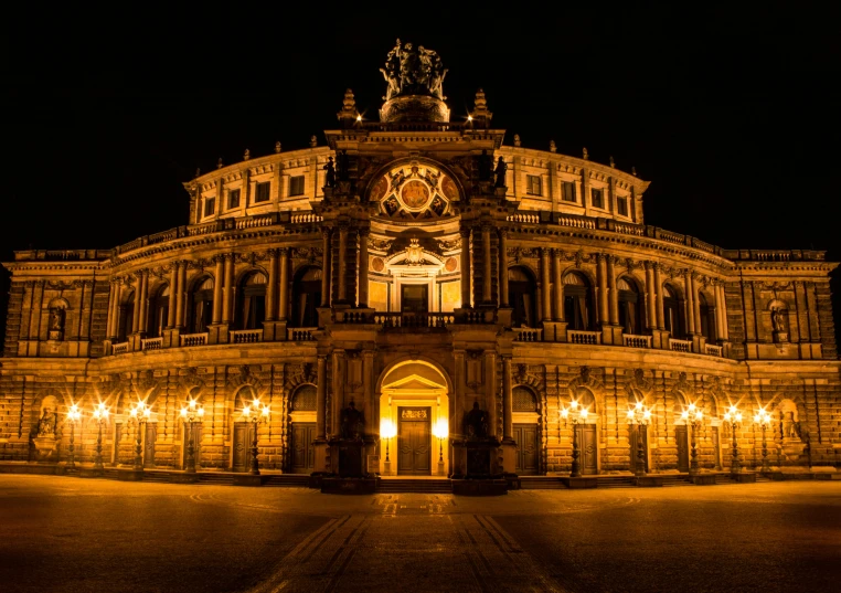 a large building that is lit up at night, pexels contest winner, baroque, sportspalast amphitheatre, avatar image, in the center of the image, high resolution photo