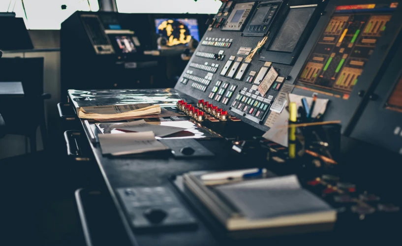 a control panel sitting in the middle of a room, unsplash, warships, production ig studios, thumbnail, charts