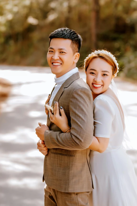 a man and a woman standing next to each other, a picture, inspired by Ruth Jên, elegant smiling pose, in a scenic background, square, darren quach