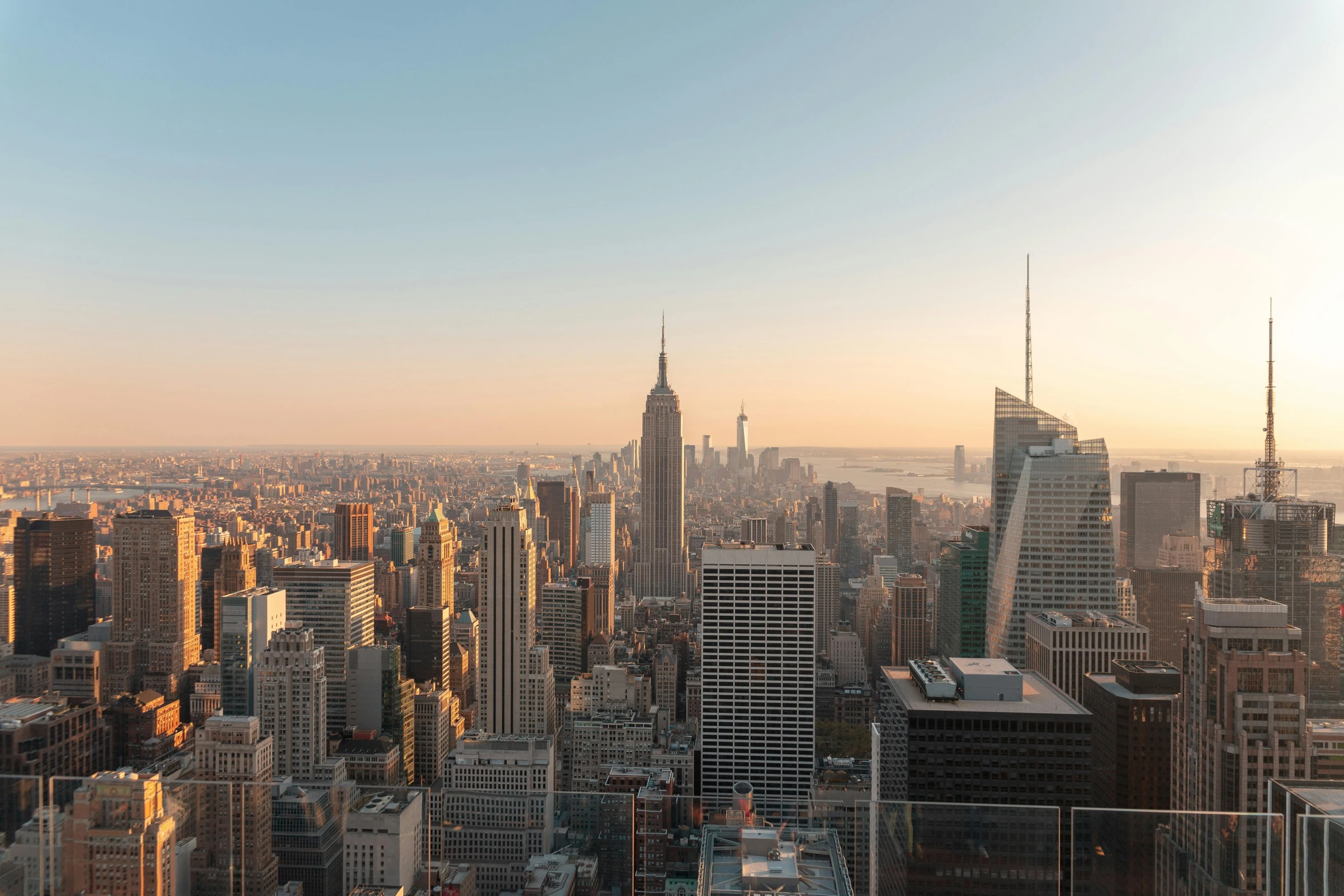 a view of a city from the top of a building, pexels contest winner, golden hour in manhattan, slide show, 2022 photograph, gigapixel photo