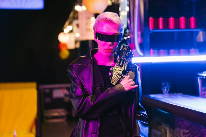a man with a gun standing in front of a bar, cyberpunk art, pexels contest winner, an epic non - binary model, wearing shiny black goggles, uncanny valley, the terminator