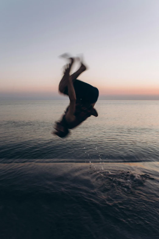 a person jumping in the air over a body of water, a picture, unsplash contest winner, evening at dusk, contorted, headshot, manly