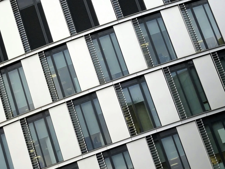 a close up of a building with many windows, flickr, foster and partners, metal shutter, architectural visualisation, award - winning