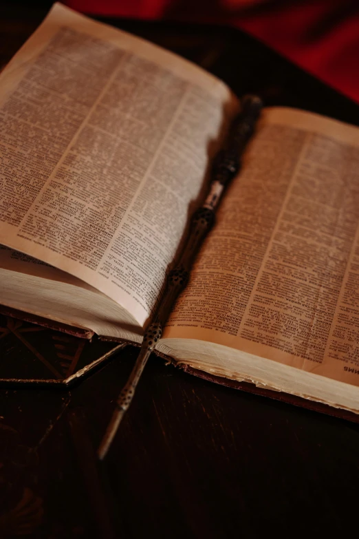 an open book sitting on top of a table