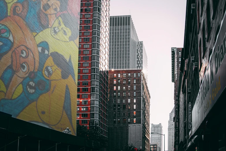 a city street filled with lots of tall buildings, a photo, pexels contest winner, pixel art, keith harring, billboard image, college, ny style grafitti