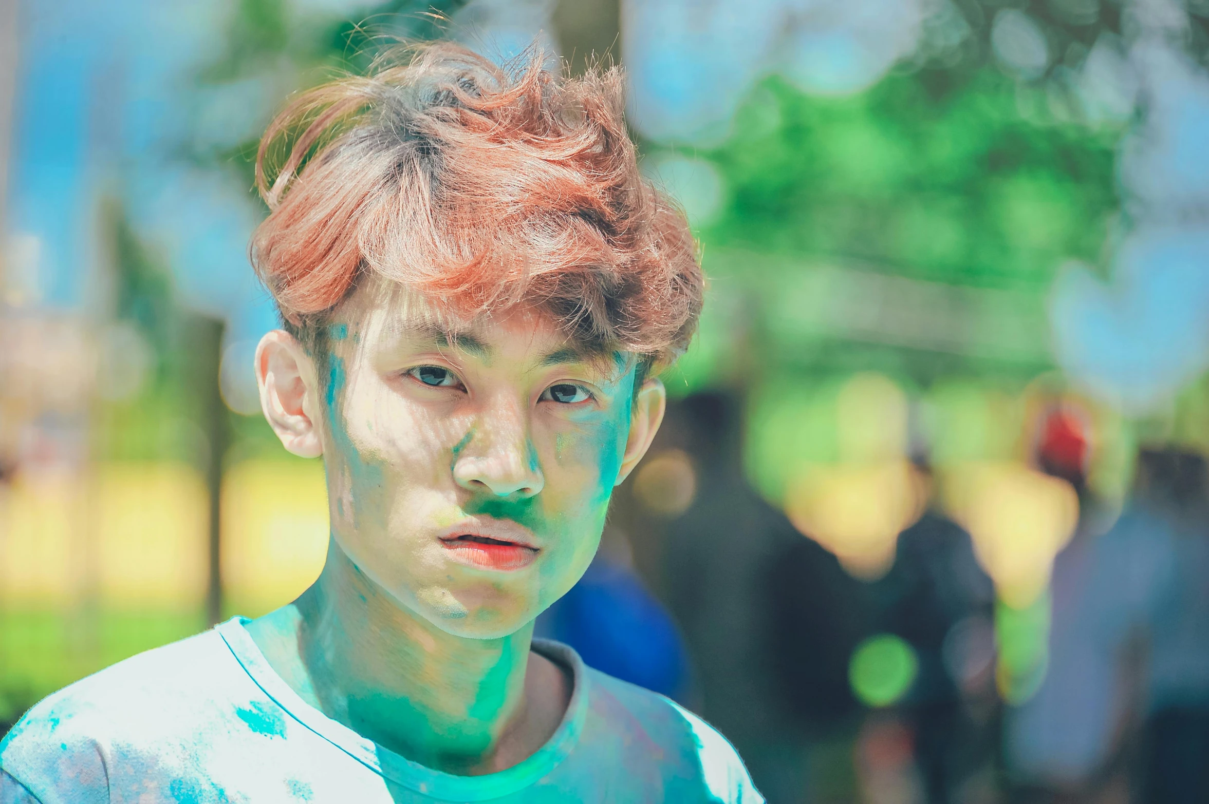 a boy with red hair and green paint on his face, a colorized photo, inspired by Yanjun Cheng, pexels contest winner, pastel faded effect, ethnicity : japanese, avatar image, casual photography