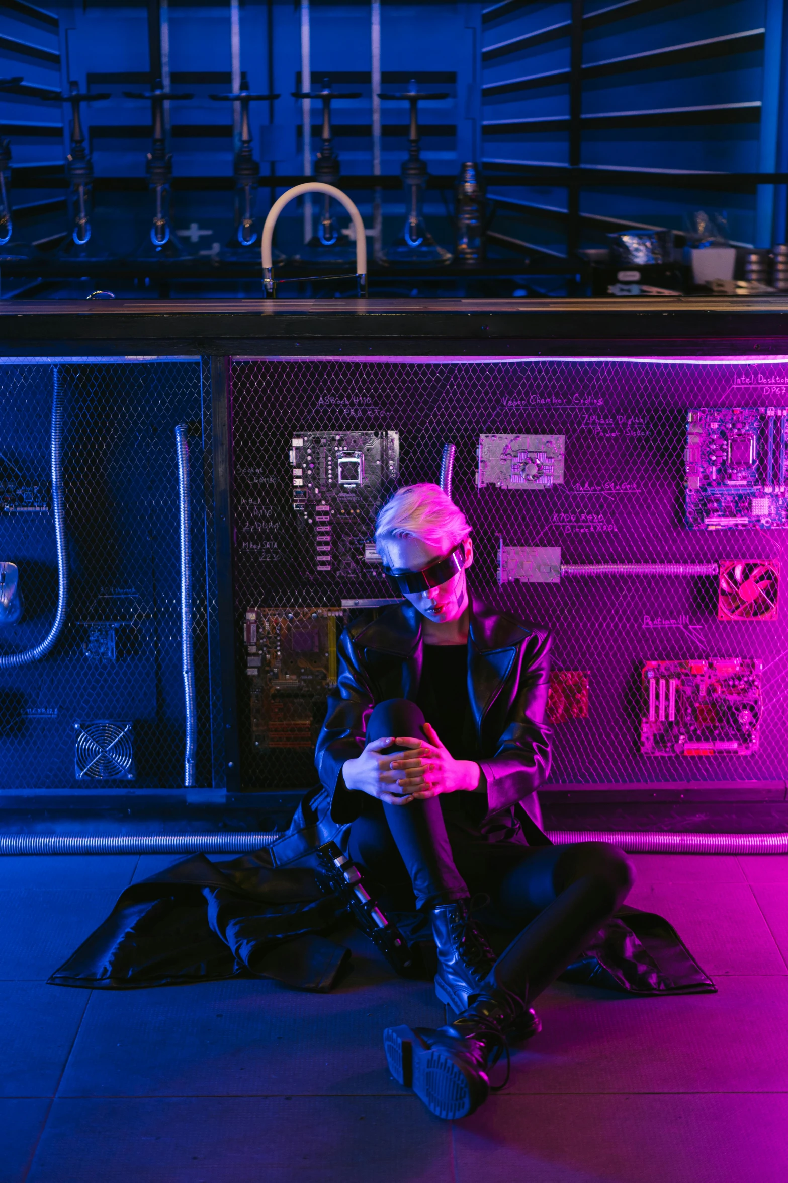 a woman sitting on the floor in a dark room, cyberpunk art, unsplash, holography, robot in a server room, cyberpunk sunglasses, cyberpunk old man, lil peep