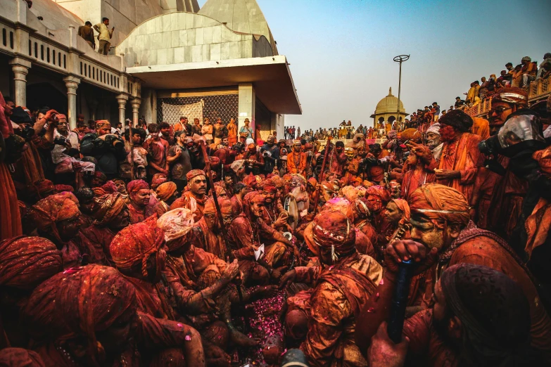 a crowd of people covered in red paint, by Daniel Lieske, pexels contest winner, samikshavad, dmt temple, sitting down, wide views, thumbnail