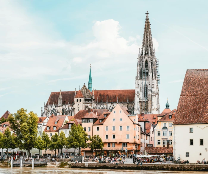 a large cathedral towering over a city next to a river, by Tobias Stimmer, pexels contest winner, renaissance, square, white, brown, german romanticism style