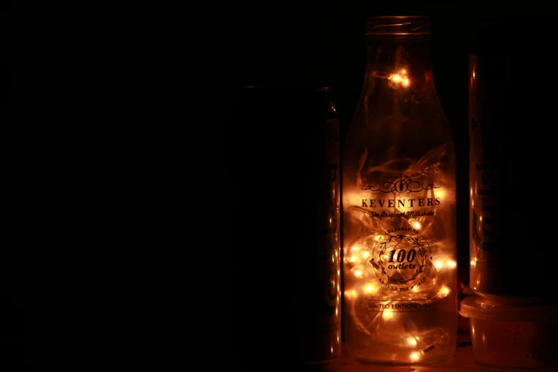 a bottle that has some lights inside of it, pexels contest winner, light and space, decorations, backlit, evenly lit, light mode