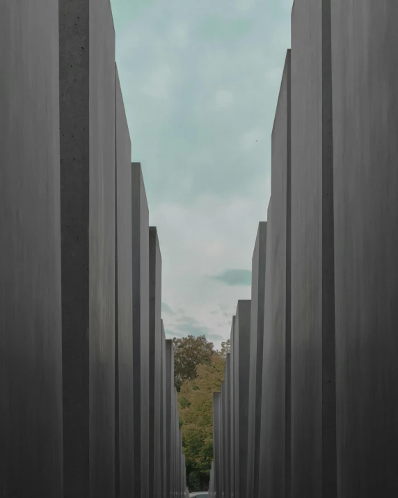 a black and white photo of the world war ii memorial, inspired by David Chipperfield, pexels contest winner, modernism, colour photograph, square lines, grey metal body, cemetery