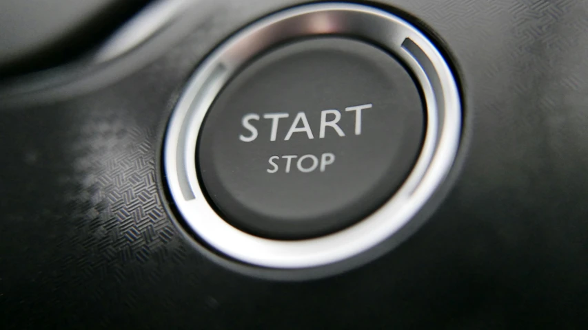 a close up of the start button of a car, pexels, les automatistes, small steps leading down, promo image, we didn't start the fire, starlit