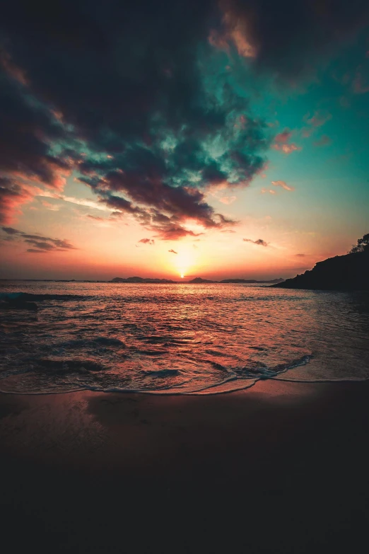 the sun is setting over the water at the beach, pexels contest winner, romanticism, deep vivid colors, instagram post, ( 3 1, uncropped