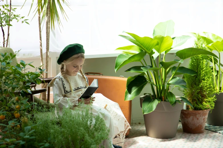 a little girl sitting on a bench reading a book, inspired by Elsa Beskow, unsplash, renaissance, large potted plant, terrarium lounge area, banana trees, using a magical tablet