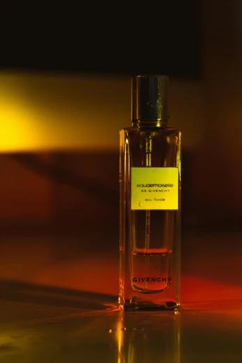 a bottle of perfume sitting on top of a table, inspired by Ruth Deckard, synthetism, givenchy, golden hours, thumbnail, shot with sony alpha