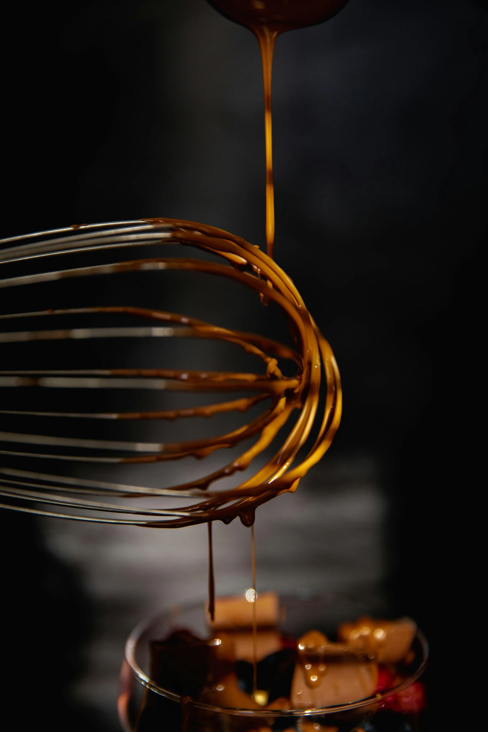 a whisk being drizzled with syrup, by David Simpson, trending on pexels, process art, fully chocolate, award - winning crisp details ”, light dark, manuka