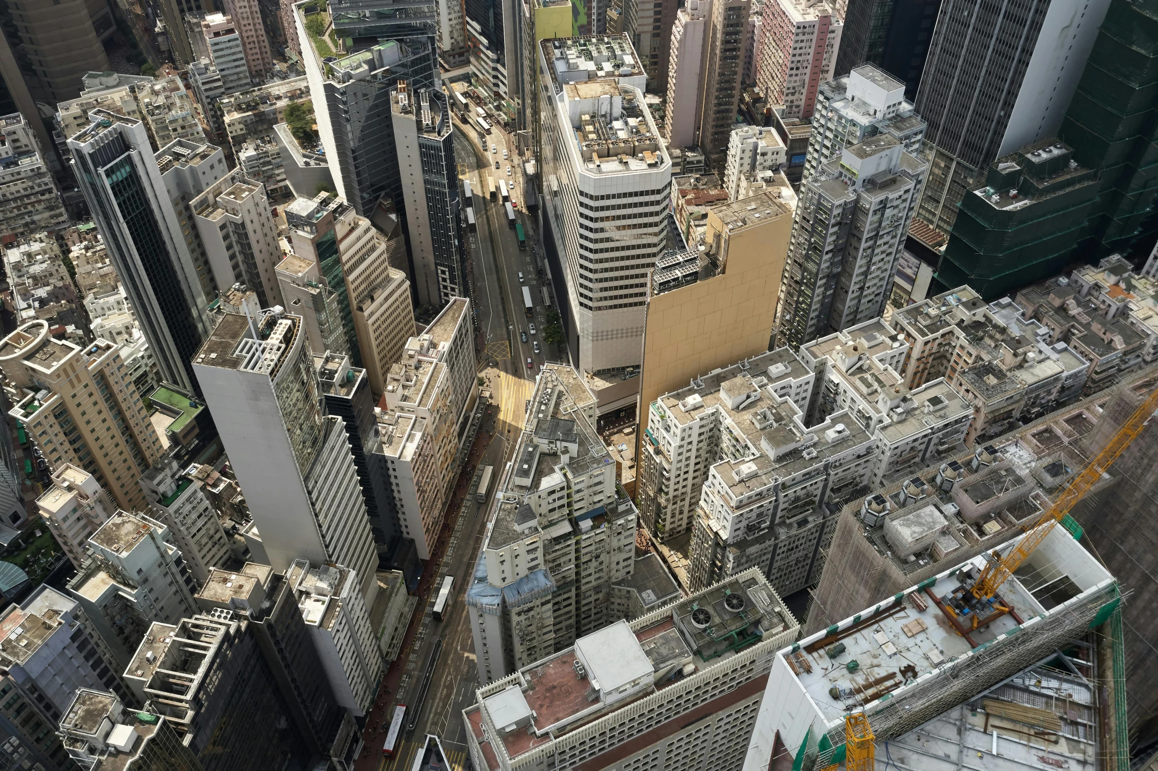 a view of a city from the top of a building, inspired by Thomas Struth, pexels contest winner, photorealism, hong kong buildings, isometric aerial view, ilustration, raising between the buildings