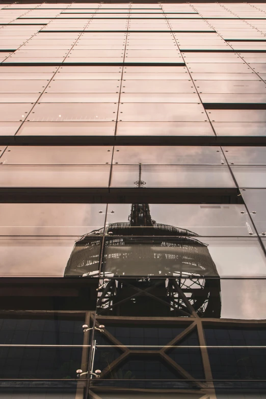 a very tall building with a clock on it's side, by Tobias Stimmer, unsplash contest winner, reflection on helmet, detail structure, glass spaceship, silhouetted